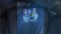 Fuyuki looks at his family's photo