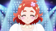 Haruka smiles as she walks down the runway