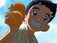 Daiki holds the oranges that Hikari dropped.