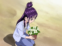 Mai holding the purified flower pot