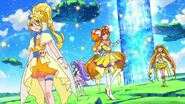 Equipo de Pretty Cure con ataques de estrella después de acabar con varios monstruos