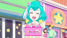 Lala holds up the box she got from Star Donut