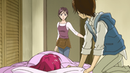 Megumi sees Coco (human form) in Nozomi's room