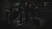 Hanna and Spencer look through Charles DiLaurentis' patient file