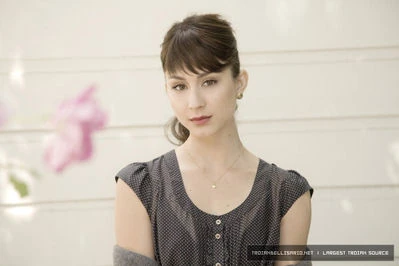 Normal Troian Bellisario looking hot and sexy at this photoshoot 005