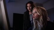Hanna and Emily watch Aria and Ezra on the security footage