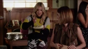 Hanna eats a slice of wedding cake