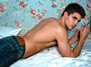 Robbie Amell Lying Down