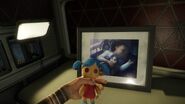 A picture of Peter's daughter and her toy.