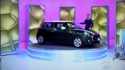 PLUS, a British Racing Green Metallic Mini Cooper Hardtop.