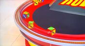 On his second roll, he has 1 car and $2,000. He decides to roll again.