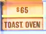 He keeps the toaster oven. The coffeemaker is $65 and goes into the Give column for a total of $100 even.