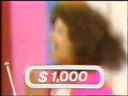Big Wheel $1,000.jpg (61 KB) For a brief period, they used a Grand Game motif for flashing the dollar amount won on the Big Wheel or any cash pricing game (as did the daytime show from 1983 to 1988). Here, this contestant, Velma just made $1.00 and won (of course) $1,000.