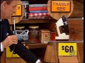 And finally, the price of the iron is $60. He wins the trip to U.S. Virgin Islands and the Chinon 35mm camera!