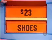 She keeps the shoes. The towels are $23, and go into the Give column.