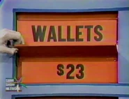 She keeps the wallets. The toothbrush is $23 and goes into the give column, which now totals $129.