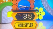 He bids $50 on the Remington hair styler. A difference of $12. He gets no card.