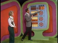 ...which totals $82. She keeps the calculator, cosmetics, and jewelry no matter what. But if they total $82 or more, she wins the trailer and sand buggy.