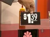 Second, she picks the Sue Bee honey.