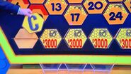 It's a C. $12,000 is now up for grabs, but the contestant decides to go for the car.
