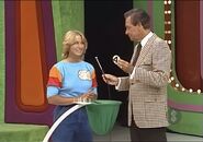 Cathy's first draw is a 4. She thinks it's the second number but is incorrect.