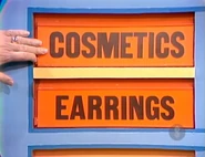The next two prizes are earrings and cosmetics.