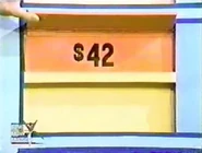 The tableware is $42 for a total of $73 in the Keep column thus far. If the clothing is $30 or more, she wins.