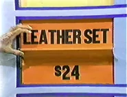 She keeps the leather set. The mirror is $24 and goes into the give column for a total of $47.