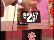 First, she picks the Planters peanuts.