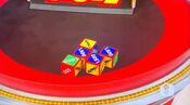 On her first roll, she has 1 car and $5,500. She decides to take the cash.