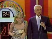 Lisa asks Bob for a $100 cash bonus for tying the record.