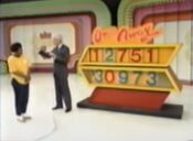 The correct price. And the reason the audience was booing her was pretty simple: The car was a Lincoln! A luxury car! Back then, you could find one with a 1 as the first digit in the price. But not now!