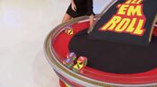 On his first roll, he has 1 car and $5,000. He decides to take the cash.