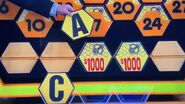 It's an A. $2,000 is now up for grabs, but the contestant decides to go for the car.