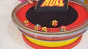 On his first roll, he has 3 cars and $1,500. He decides to roll again.