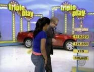 Drew Carey sees a contestant win Triple Play!