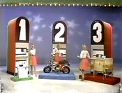 She picks the Honda Trail 70 motorcycle.