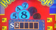 She says the second number is a 6 but is incorrect. The car is now 50¢.