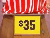 The price of the Jonathan Martin blouse.