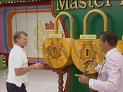 He tries again, and now it has stuck into the first lock.