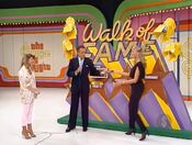 She cannot win the color TV now, but she can still win the refrigerator freezer and the dune buggy if she chooses the right autograph book that contains "Second Chance".