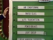 First, she picks the air conditioning.