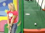 The contestant has also missed her putt. But luckily...