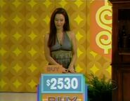 She buys the wine cabinet...