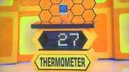 She bids $25 on the ThermPro thermometer. A difference of $2. She picks card #23.
