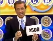 On her third punch, she has $500. She decides to throw it away.