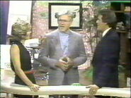 Tom chatting w/ Susan and original Wheel host Chuck Woolery at the end