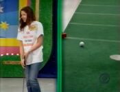 The contestant has missed her putt. But fortunately...