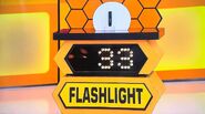 He bids $25 on the Olight pocket flashlight. A difference of $8. He picks card #22.