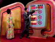 ...and go into the give column for a total of $91. She keeps the vacuum, mixer, and wallets no matter what. But if they total $91 or more, she wins.